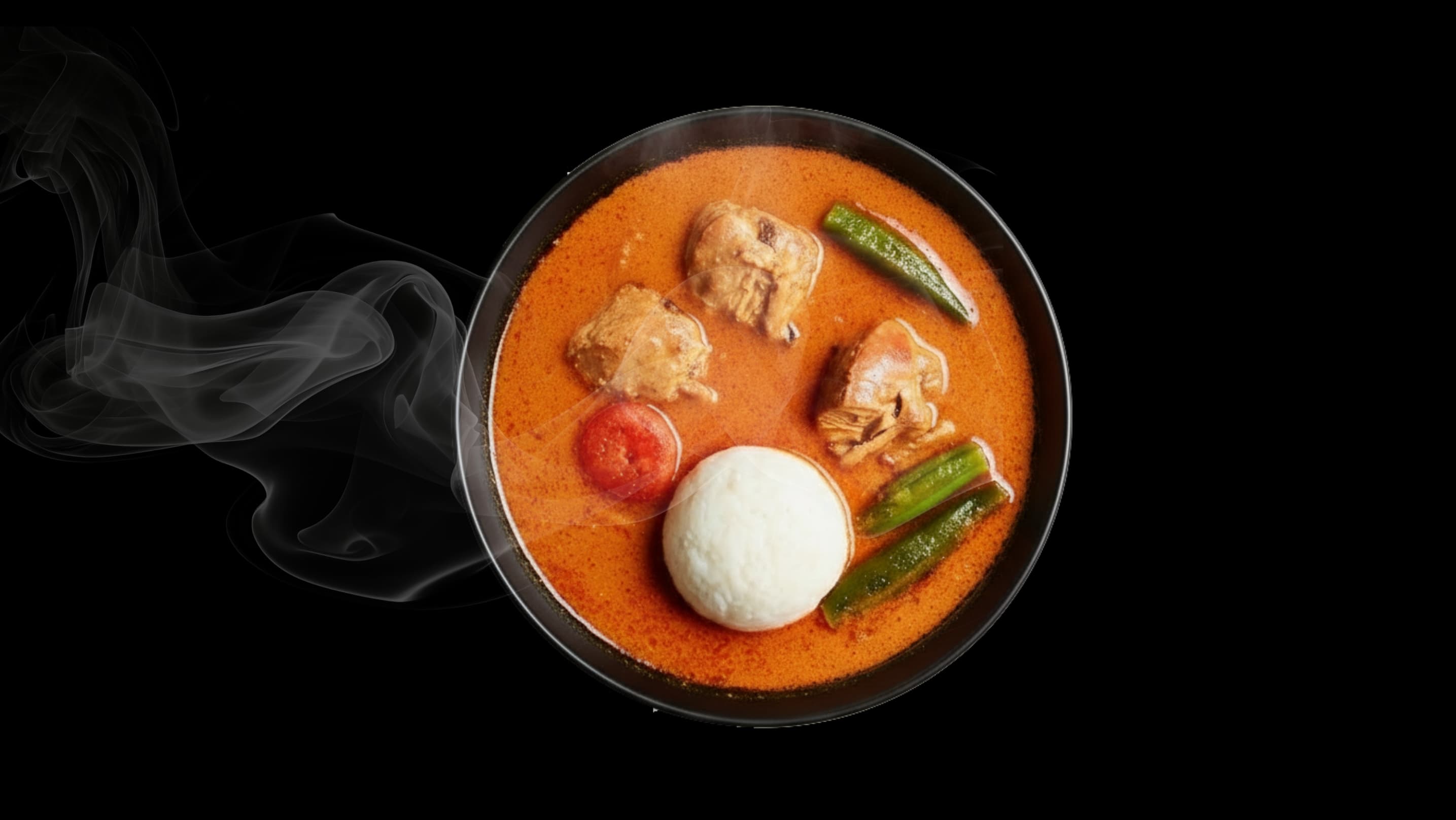 Peanut butter soup with fufu, chicken, okra, and tomato in rich broth